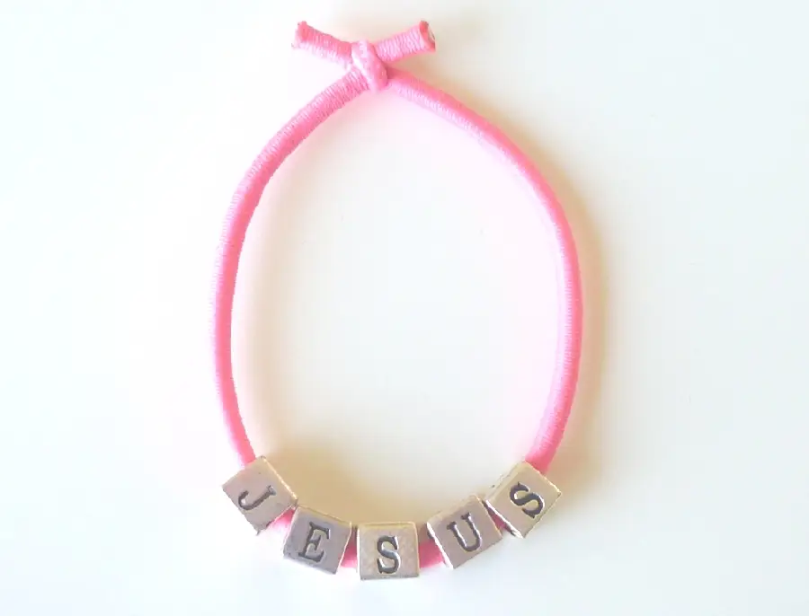 Elastische armband jesus-roze
